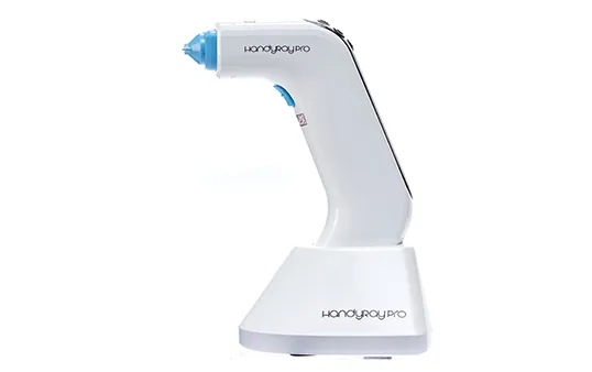 HandyRay-Pro laser lancing device on its charging base